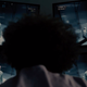 Mr. Glass observing David Dunn.